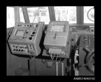 Photographic negative showing navigational equipment on a boat