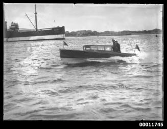 Motorlaunch on Sydney Harbour, SS OMANA in background