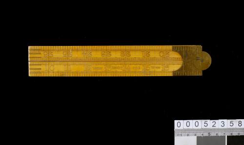 Folding wooden ruler