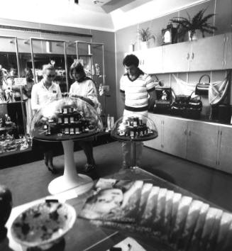 Photograph depicting a couple shopping