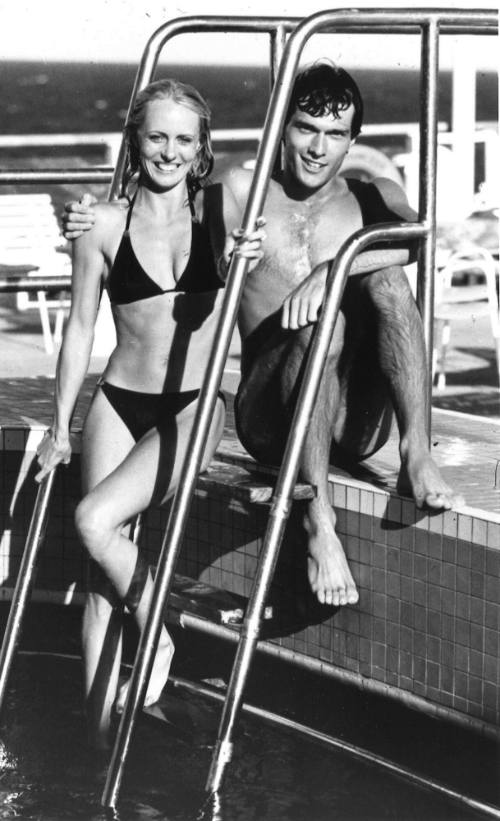 Photograph depicting a couple at a ship's pool