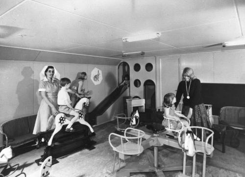 Photograph depicting a children playing at a ship's nursery