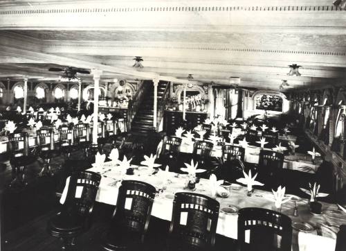 Photograph depicting a ship's restaurant