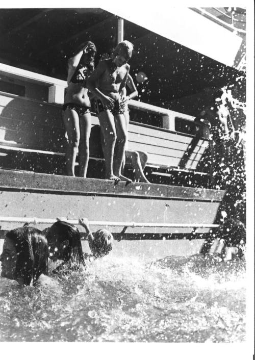 Photograph depicting a group of children in the swimming pool