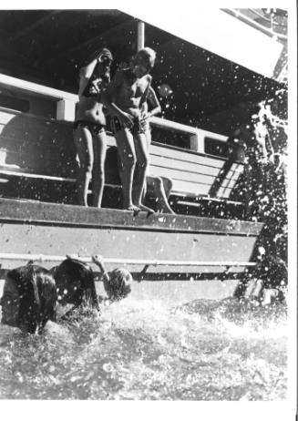 Photograph depicting a group of children in the swimming pool