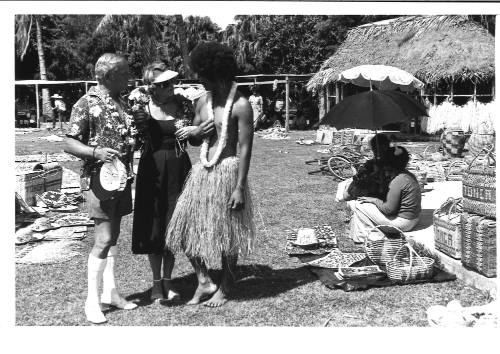 Photograph depicting a couple shopping ashore