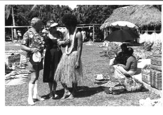 Photograph depicting a couple shopping ashore