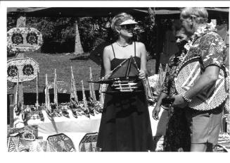 Photograph depicting a couple shopping ashore