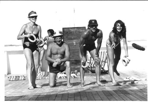 Photograph depicting two couples playing quoits