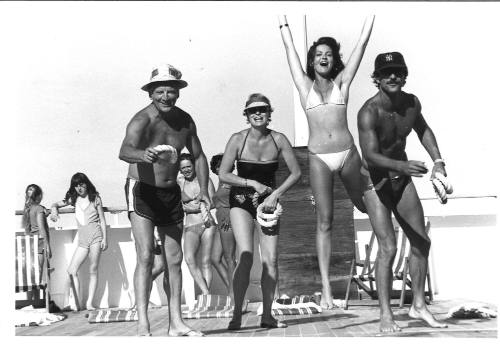 Photograph depicting two couples playing quoits