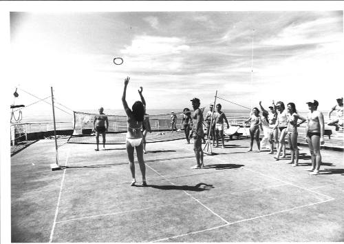 Photograph depicting passengers playing deck tennis