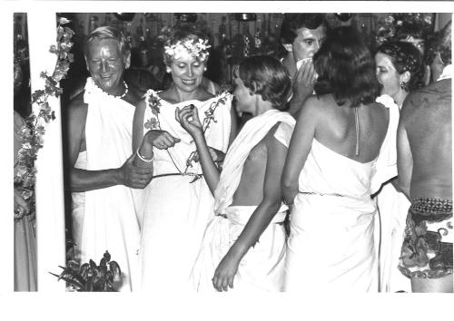 Photograph depicting passengers at a Roman themed party