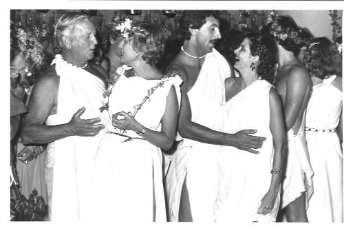 Photograph depicting passengers at a Roman themed party