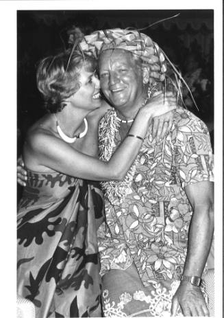 Photograph depicting a couple at a Pacific themed party