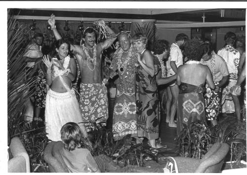 Photograph depicting passengers at a Pacific themed party