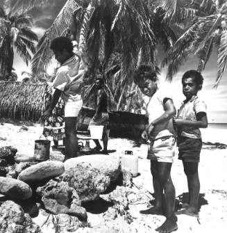 Photograph depicting a Pacific landscape with children