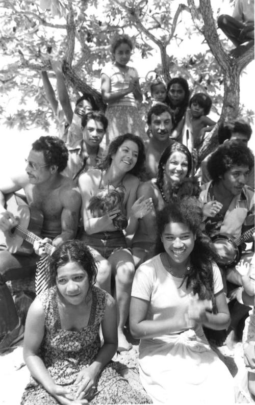 Photograph depicting a group of tourists and Pacific Islanders