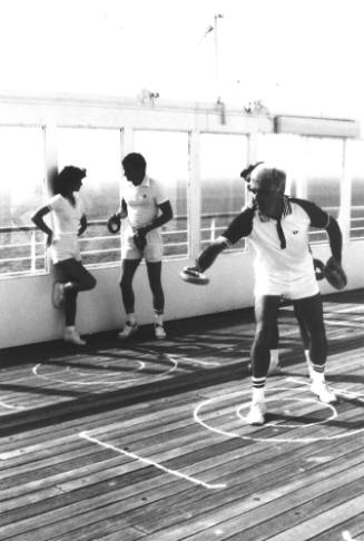 Photograph depicting passengers on ORIANA's sports deck