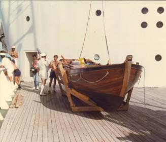 Photograph depicting CHILD OF BOUNTY raft boat on ORIANA's deck