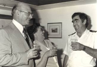 Photograph depicting P&O captain JF Wacher and two passengers