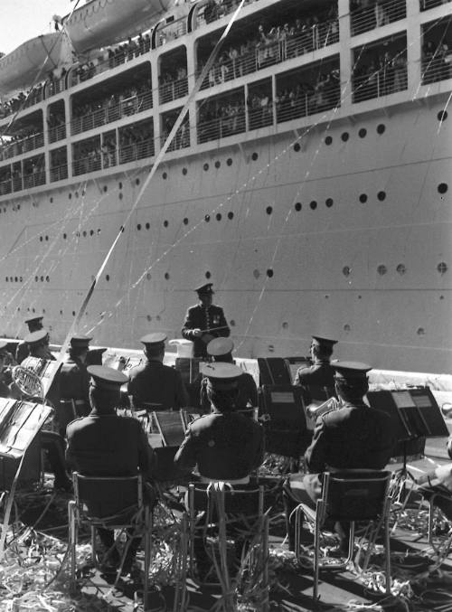 Military band playing at the departure of a P&O liner