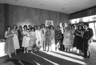 Photograph depicting a group of people posing for the camera