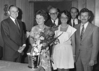 Photograph depicting a group of people posing for the camera