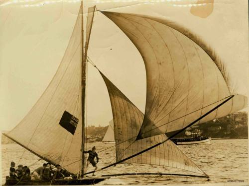 Skiff, with several crew members