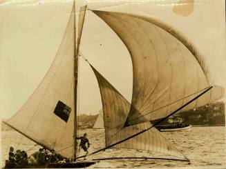 Skiff, with several crew members