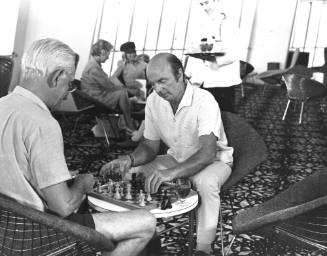 Photograph depicting two men playing chess