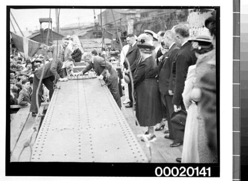 Launching of HMAS WARREGO (II) at Cockatoo dockyard