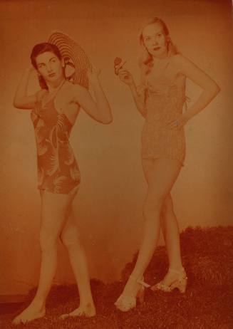 Photograph depicting two women in swimming suits