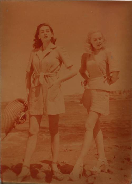 Photograph depicting two women in beach wear