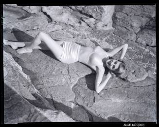 Negative depicting a woman in a bikini