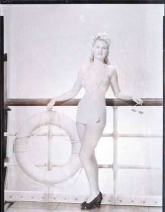 Negative depicting a woman in swim wear