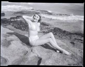 Negative depicting a woman in a bikini