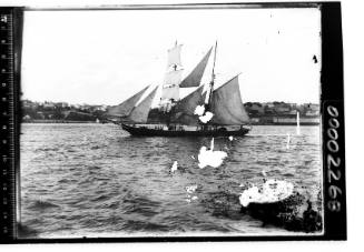 Brigantine HERMAPHRODITE under sail on an unknown harbour