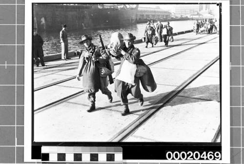 Australian Army soldiers walking along Pyrmont Wharf in Sydney