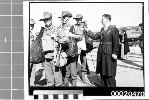 Australian Army soldiers with an ABC reporter in Sydney