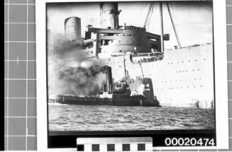 RMS QUEEN MARY and what is most likely the tug SS HEROIC in Sydney Harbour