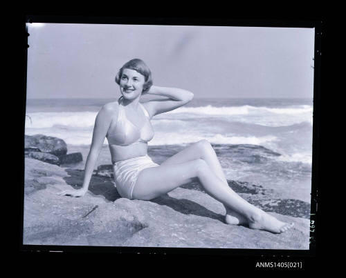 Negative depicting a woman in a bikini