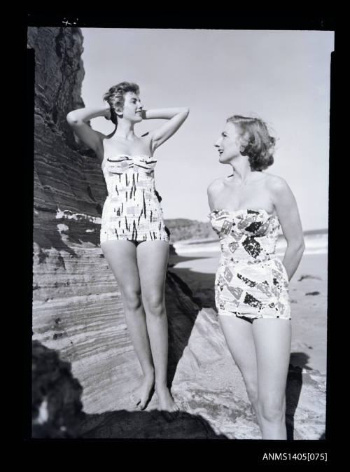 Negative depicting two women modelling swimwear