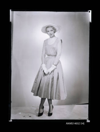 Negative depicting a woman modelling a summer dress