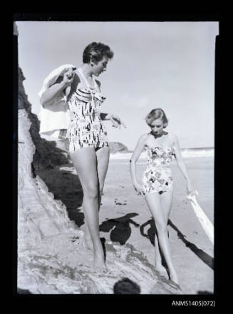 Negative depicting two women modelling swimwear