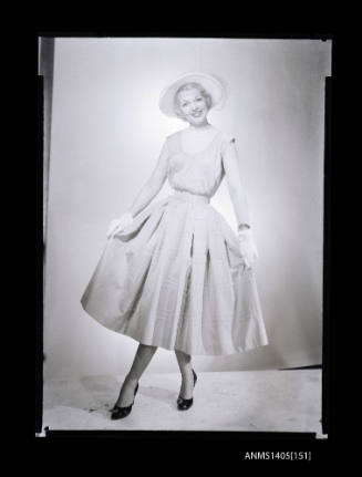 Negative depicting a woman modelling a summer dress