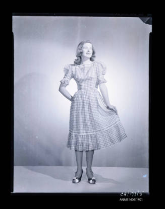 Negative depicting a woman modelling a summer dress