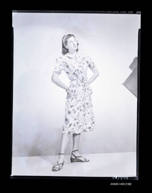 Negative depicting a woman modelling a summer dress