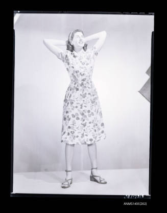 Negative depicting a woman modelling a summer dress