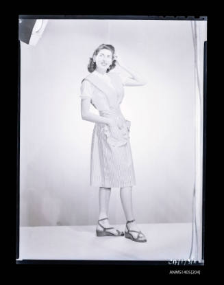 Negative depicting a woman modelling a summer dress