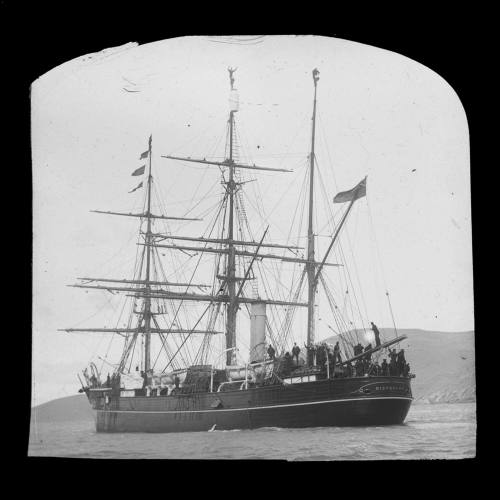 The DISCOVERY at sea with crew on deck